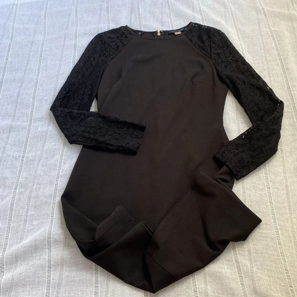 Tommy Hilfiger little black dress with long sleeves lace sleeves.